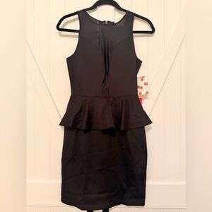 Marilyn Monroe Black Sleeveless Peplum Mini Dress